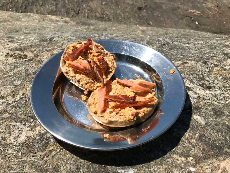 smoked trout and crab spread on a bagel